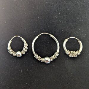 Three Single Vintage Sterling Silver Bali Hoop Earrings